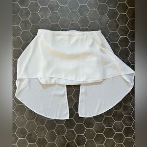 Flowy white tube top with back zipper. Worn once.